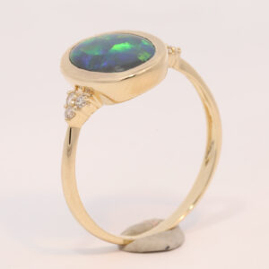 Yellow Gold Blue Green Yellow Purple Solid Australian Black Opal and Diamond Engagement Ring