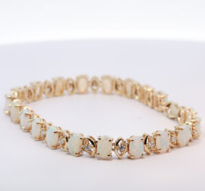 Yellow Gold Blue Green Yellow Orange Solid Australian Crystal Opal and Diamond Bracelet